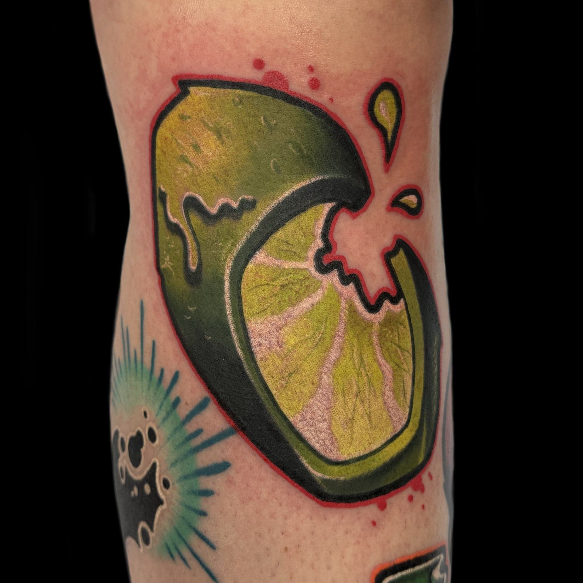 New school lime slice tattoo by Jeremy Miller