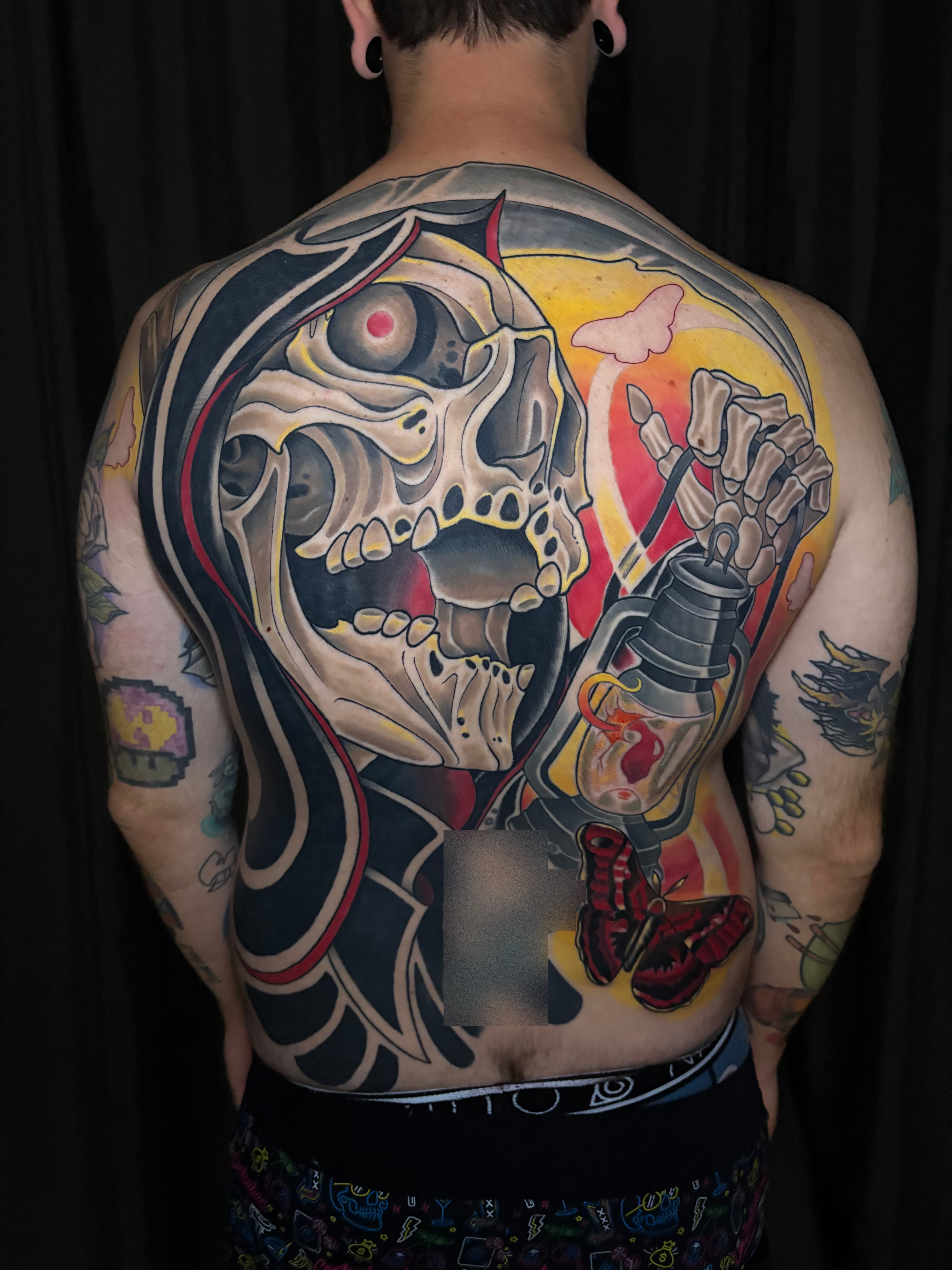 Neo traditional reaper with lantern and moths tattoo by Tanner Riggs