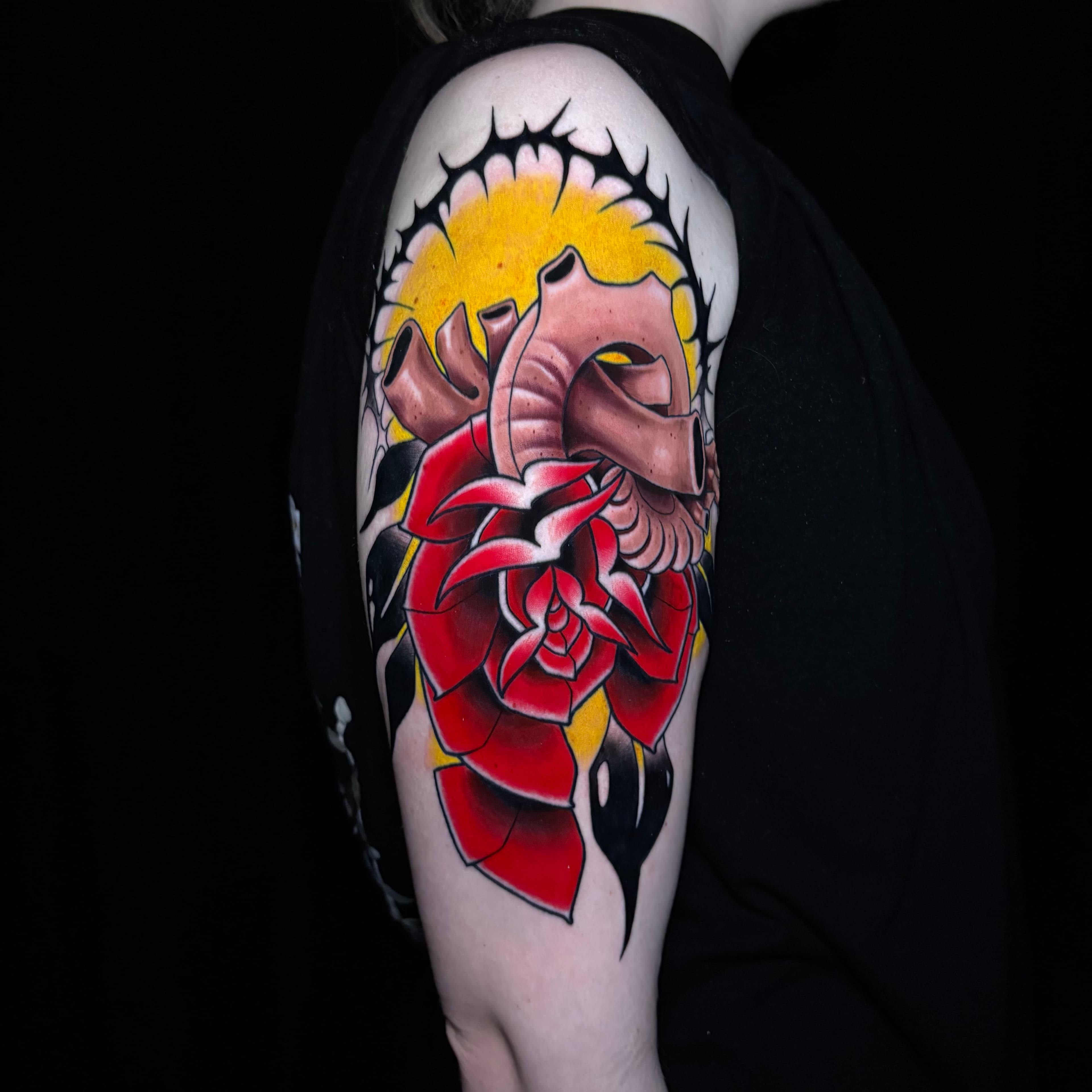 Neo traditional rose heart tattoo by Tanner Riggs