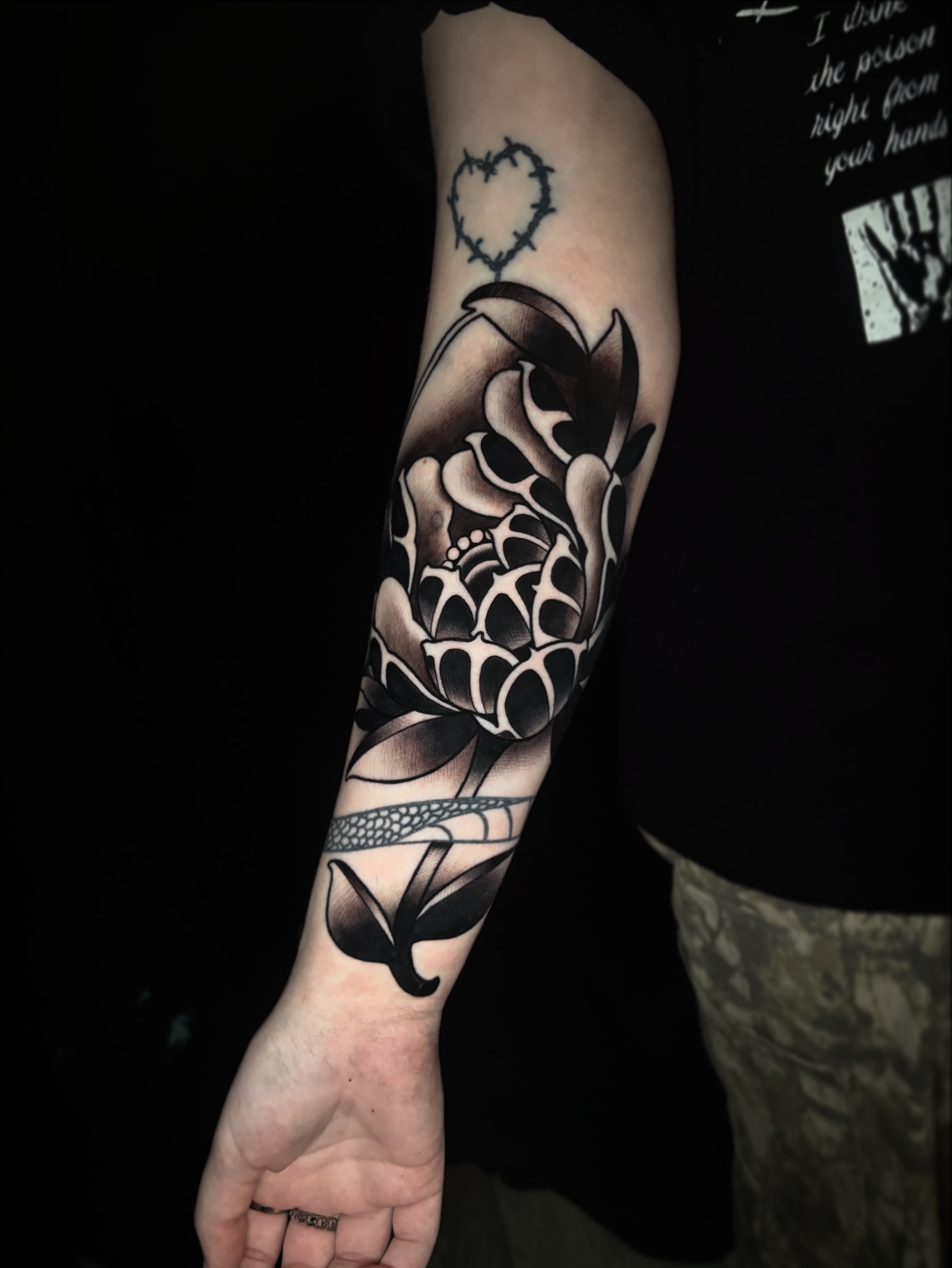 Neo traditional blackwork peony tattoo by Tanner Riggs