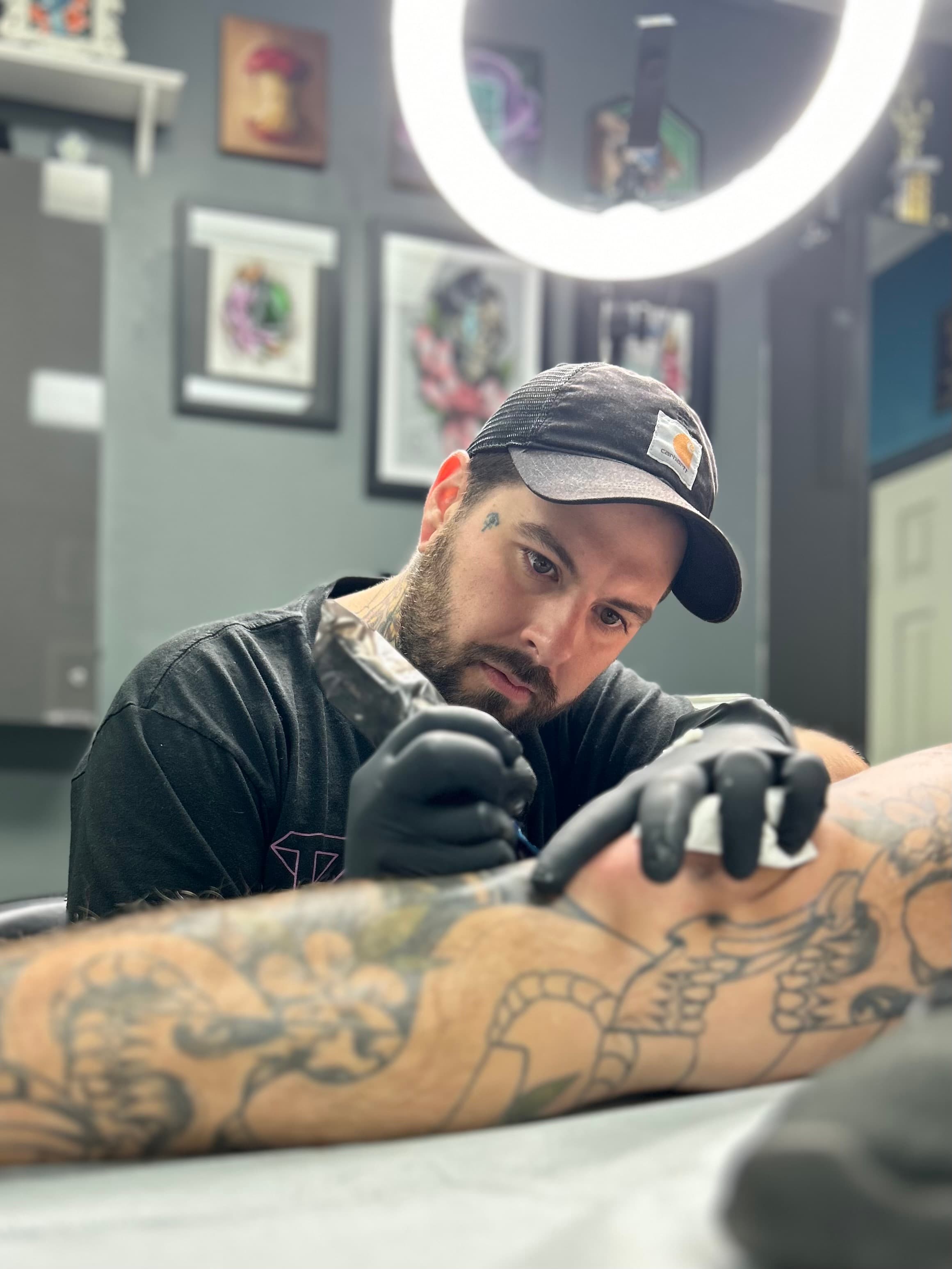 Tanner Riggs tattooing at Pigment ATX